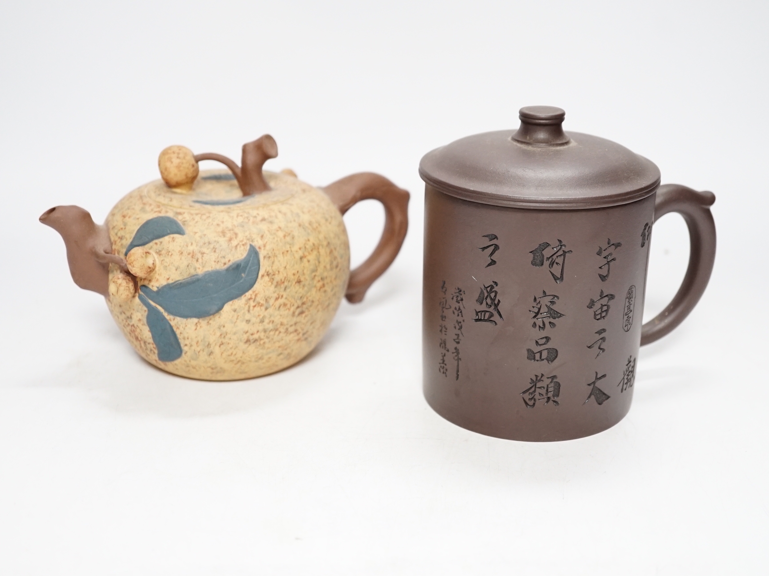 Two Chinese Yixing pottery teapots, one Republic period. Tallest 12.5cm